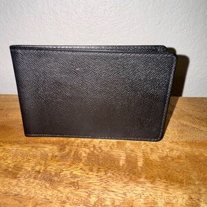 Authentic Louis Vuitton Black Tiaga ID Holder